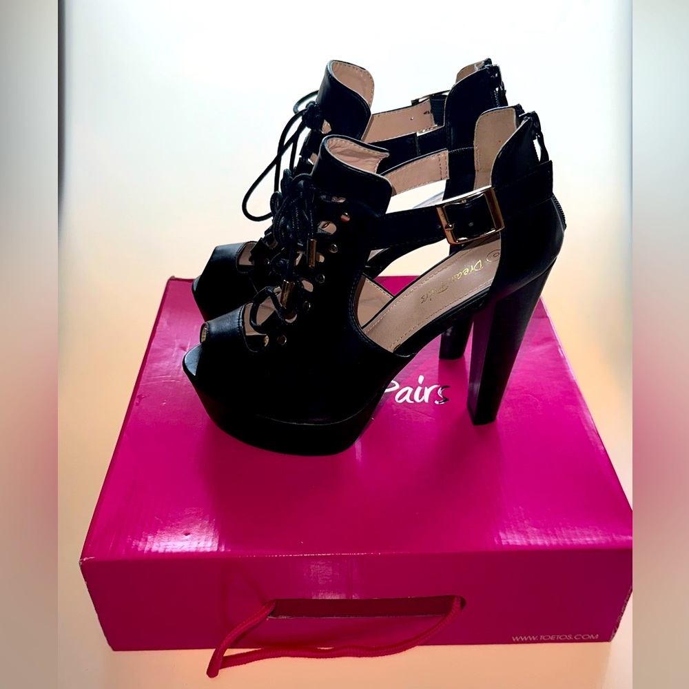 Black platform tie up heel with back zipper sz 9.